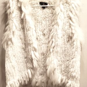 White fur vest